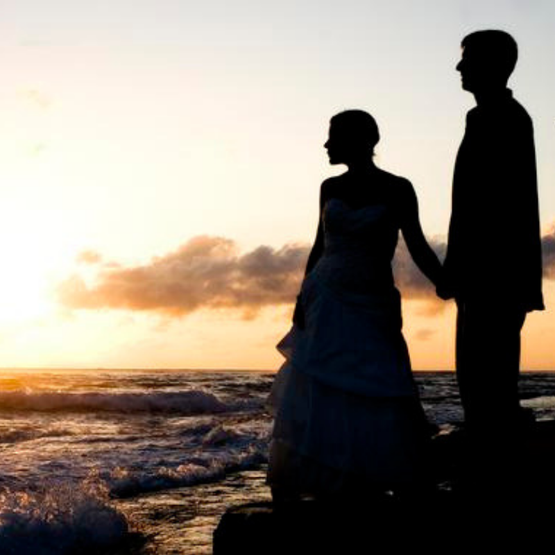 couple photographed on steps beach in puerto rico for blog post ideas for destination wedding and elopement photographers